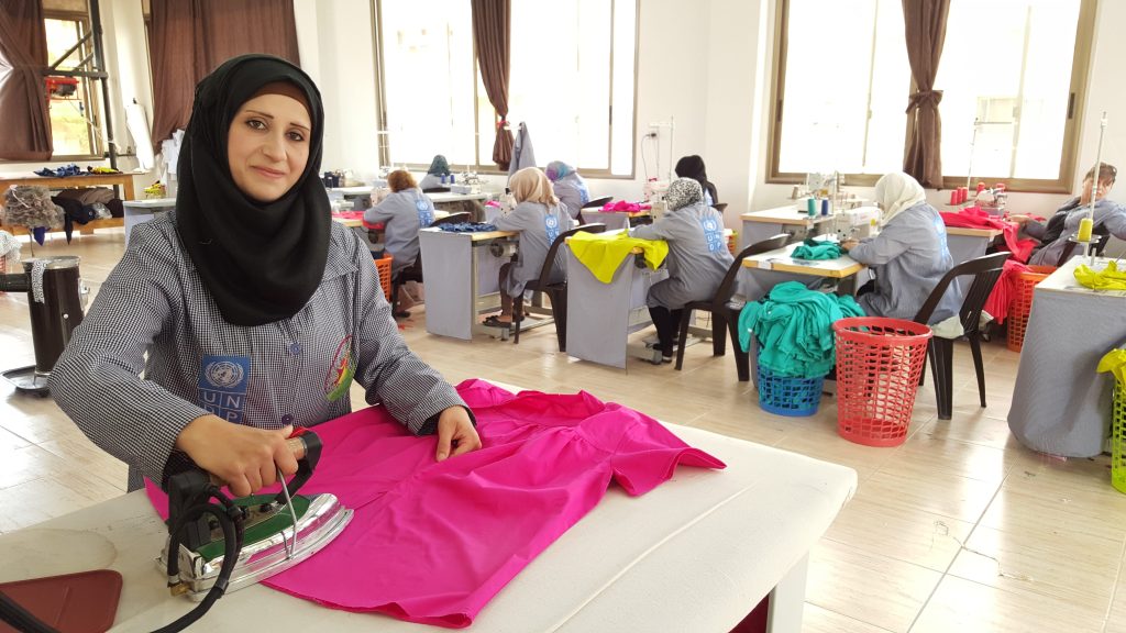 woman sewing The impact of pilgrimage to Karbala and Najaf on the world Muslim community touran travel agency